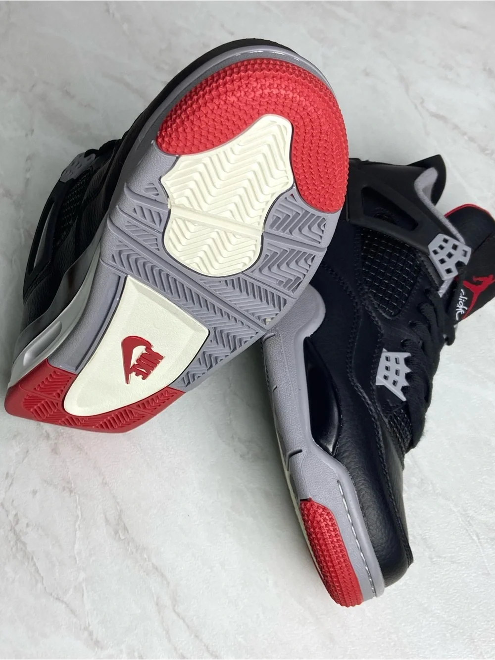 Jordan Black Sneakers with Red and Gray Accents